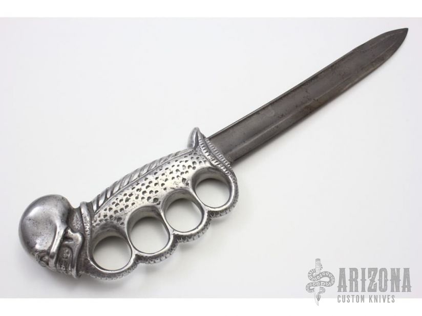 Brass knuckles? Check. Weird blades? Check. Spikes? Check. Zombies