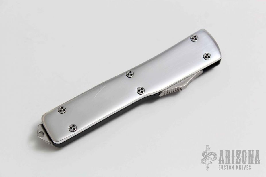 147-3 UTX-70 - D/E Black Full Serrated - Polished