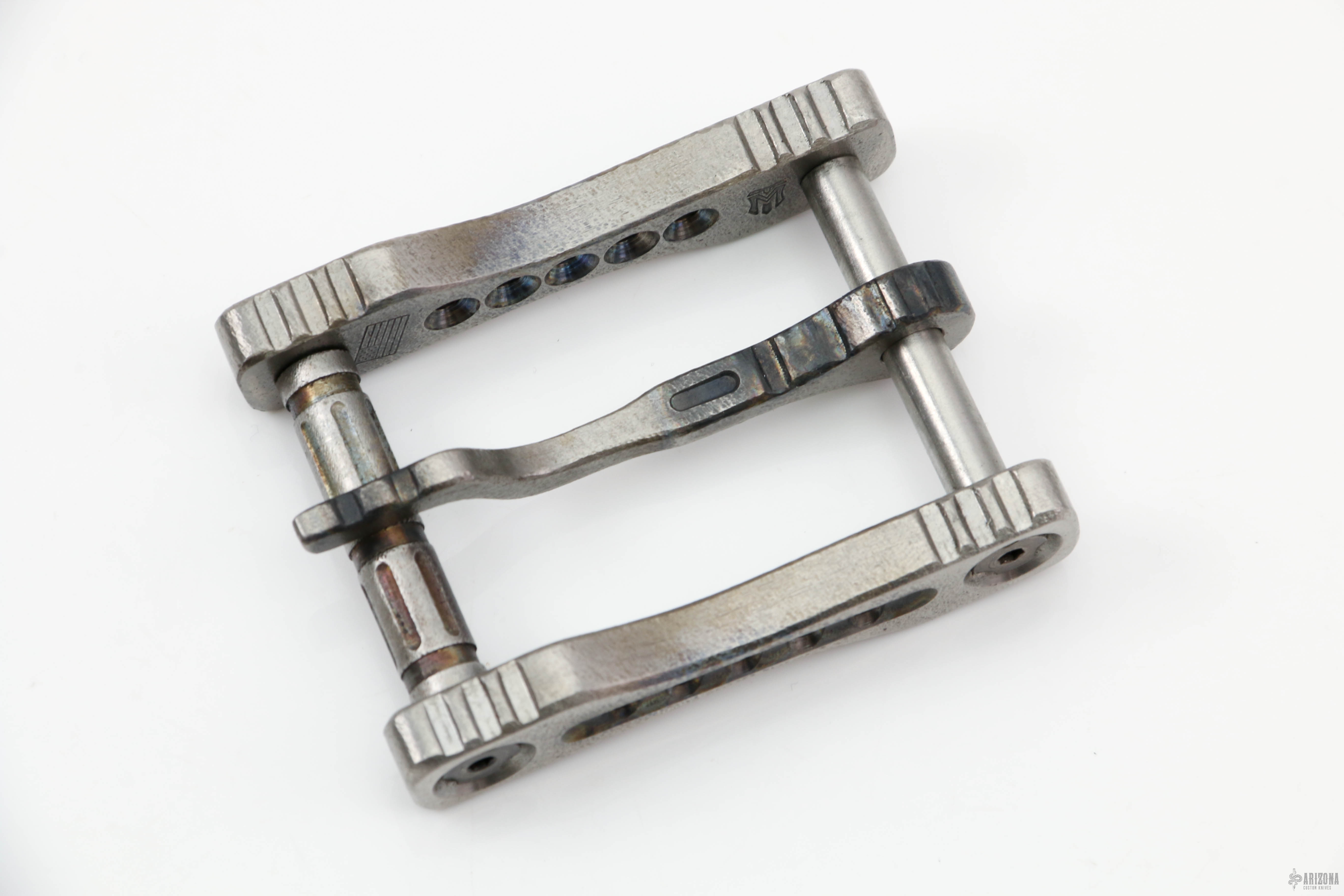 Titanium belt outlet buckle