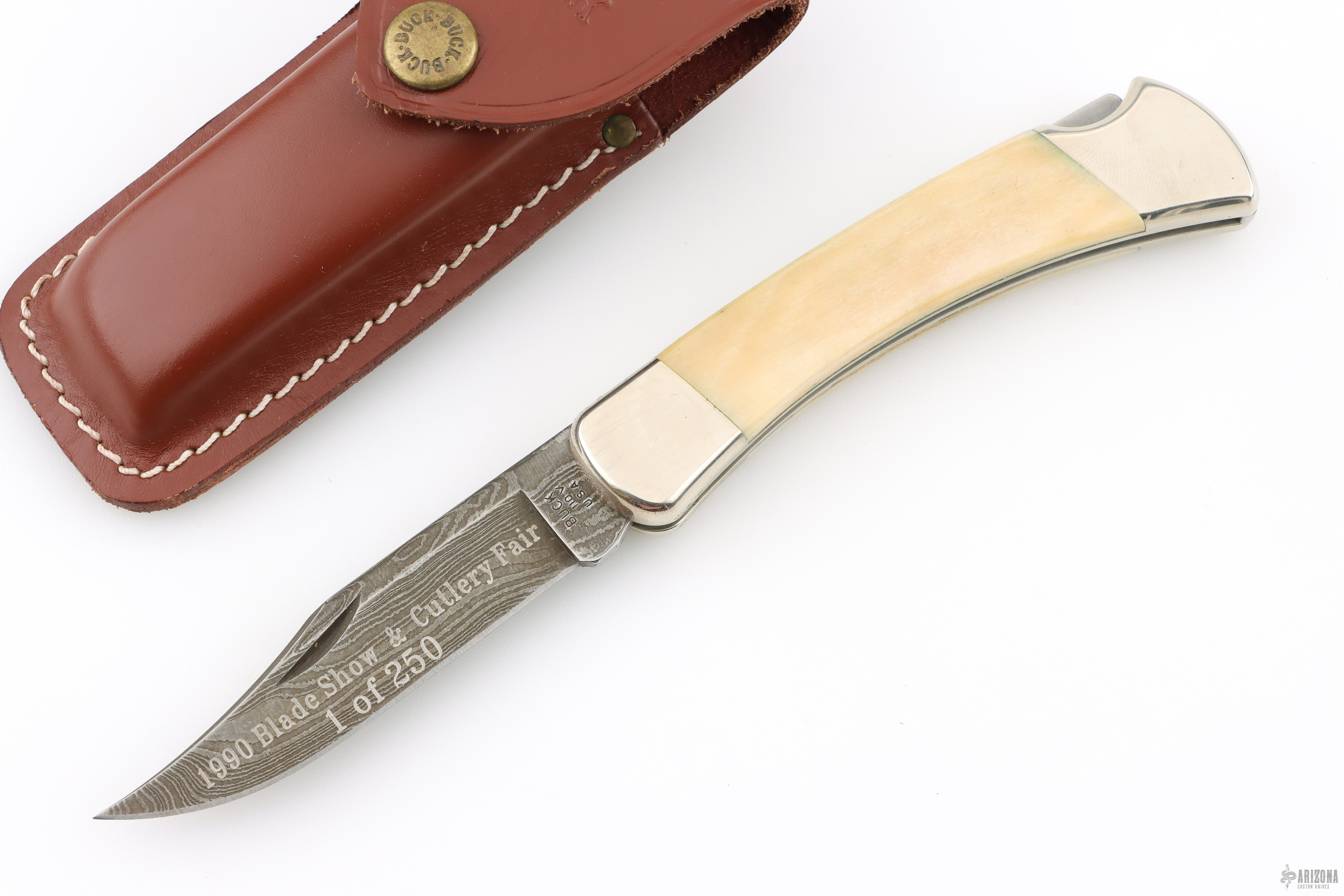Model 110 Damascus/Stag Folding Hunter - 1990 Blade Show & Cutlery