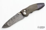 Damascus Button Lock