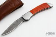 Red Coral and Damascus Bolster Release