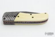 Ivory and Damascus Auto