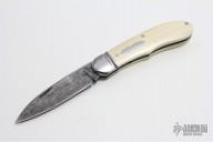 Damascus and Ivory Rounder