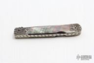 Damascus and Black Lip Pearl Lockback