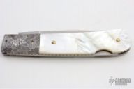 Mother of Pearl and Damascus Lockback
