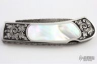 "Vegas" Damascus Engraved Lockback