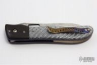 Notorious with Damasteel Blade