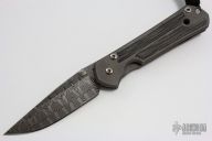 Small Sebenza 21 - Damascus and Micarta