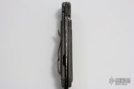 Small Sebenza 21 - Damascus and Micarta