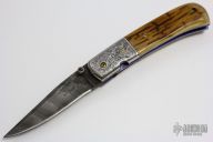 Engraved Damascus and Mammoth Linerlock