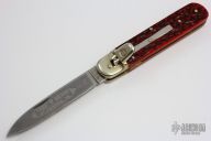 Jigged Red Bone Lever Lock Auto (#712)