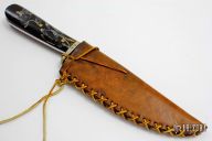 Fixed Blade with Serrated Spine and Leather Sheath