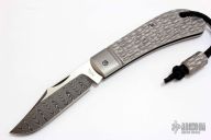 Jigged Titanium Lanny's Clip with Damascus Blade