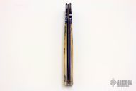 Coke Bottle Style Folding Dagger - Damascus and Mammoth