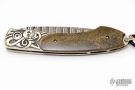 B12 Primeval Damascus Button Lock #28/50