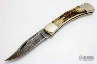 Model 110 - Damascus and Stag