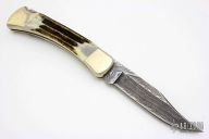 Model 110 - Damascus and Stag