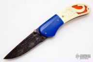Carved Linerlock Folder - Damascus