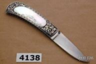 sliding scale lockback