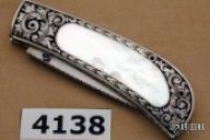 sliding scale lockback