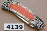 sliding scale lockback