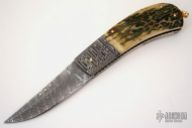 Large Damascus & Mammoth Ivory Lockback