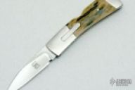 Integral lockback auto