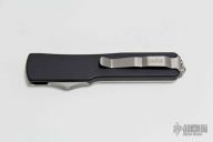 147-3 UTX-70 - D/E Black Full Serrated - Polished