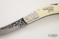 Engraved Ivory Lockback