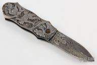 Carved Auto w/ Feather Damascus Blade