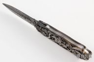 Carved Auto w/ Feather Damascus Blade
