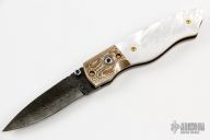 Damascus Mokume and Pearl Button Lock