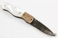 Damascus Mokume and Pearl Button Lock