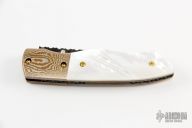 Damascus Mokume and Pearl Button Lock