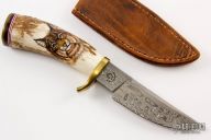 Scrimshawed Damascus Hunter