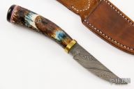Scrimshawed Damascus Hunter