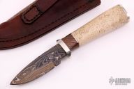 Hunter w/ Walrus Jaw & Redwood Burl 