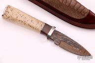 Hunter w/ Walrus Jaw & Redwood Burl 