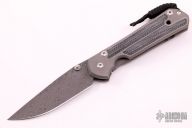 Large Sebenza 21 - Raindrop Damascus and Black Canvas Micarta