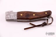 Engraved "Tumi" Linerlock