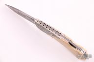 Damascus and Mammoth Engraved Lockback