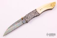 Damascus and Gold Lip Pearl Linerlock