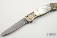 Damascus Bolster Release Auto