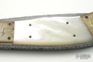 Damascus Bolster Release Auto