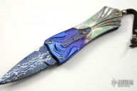 Carved Damascus & Black Lip Pearl Folder