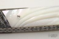 Damascus and Pearl Button Release Automatic (L. Newton)