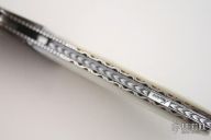 Damascus and Pearl Button Release Automatic (L. Newton)