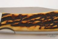 Model FC304 Jigged Bone Mid-Lock Clip Point