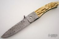 Model LLD Mammoth & Damascus Linerlock